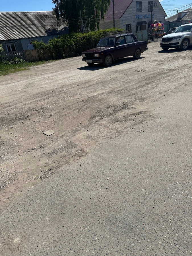 Горожане о разбитой дороге в Тепличном: Хочется взять машину на руки