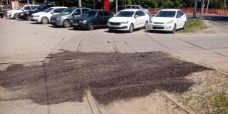 На Клочкова трамвайные рельсы закатали в асфальт На Клочкова трамвайные рельсы закатали в асфальт